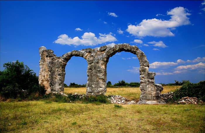The two surviving arches of the principia of the Roman camp at Burnum, near Kistanje